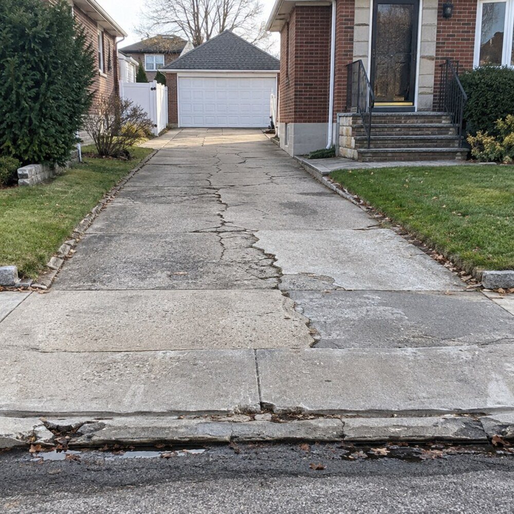 Paver driveway and apron in Whitestone, Queens, before