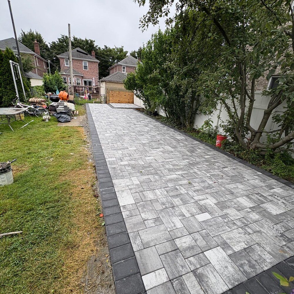 Backyard patio and retaining wall in Pelham Bay, Bronx, after