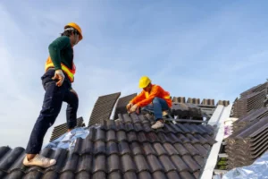 two roofing professional working on a roofing project in the bronx, ny